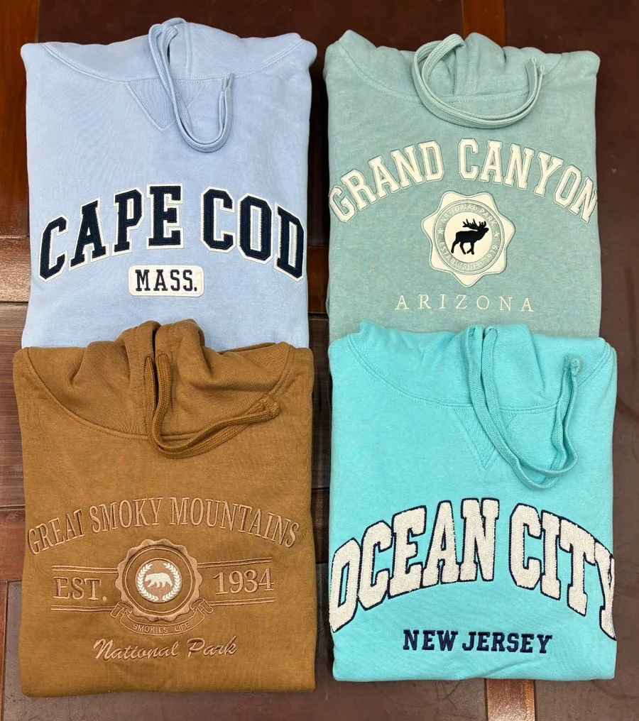 Appliqué embroidered name-drop hoodies
