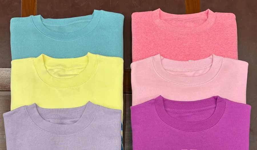 Garment-dyed crewneck sweatshirts in pastel shades